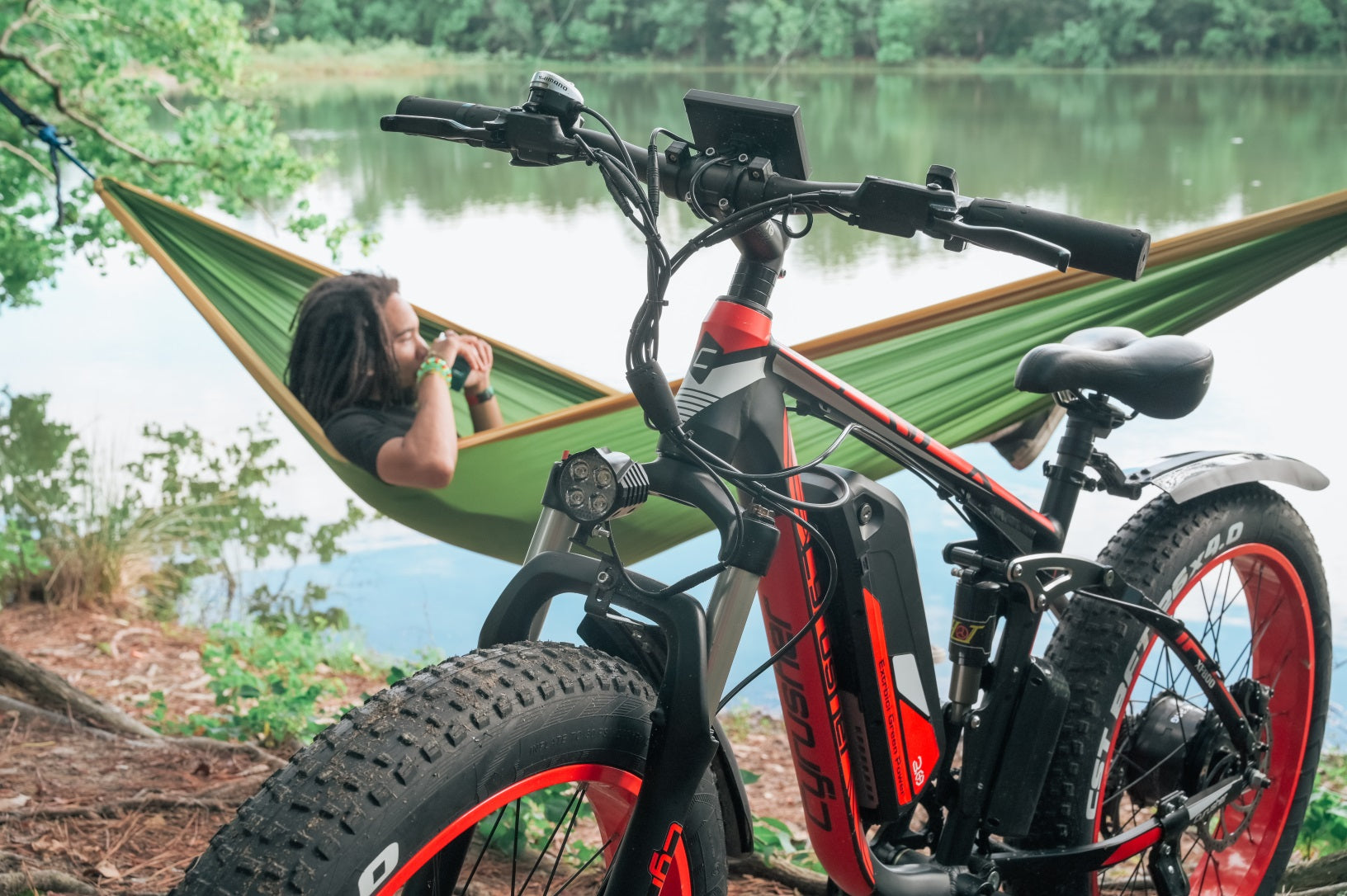 A man rides an electric bike to the lake.-0930